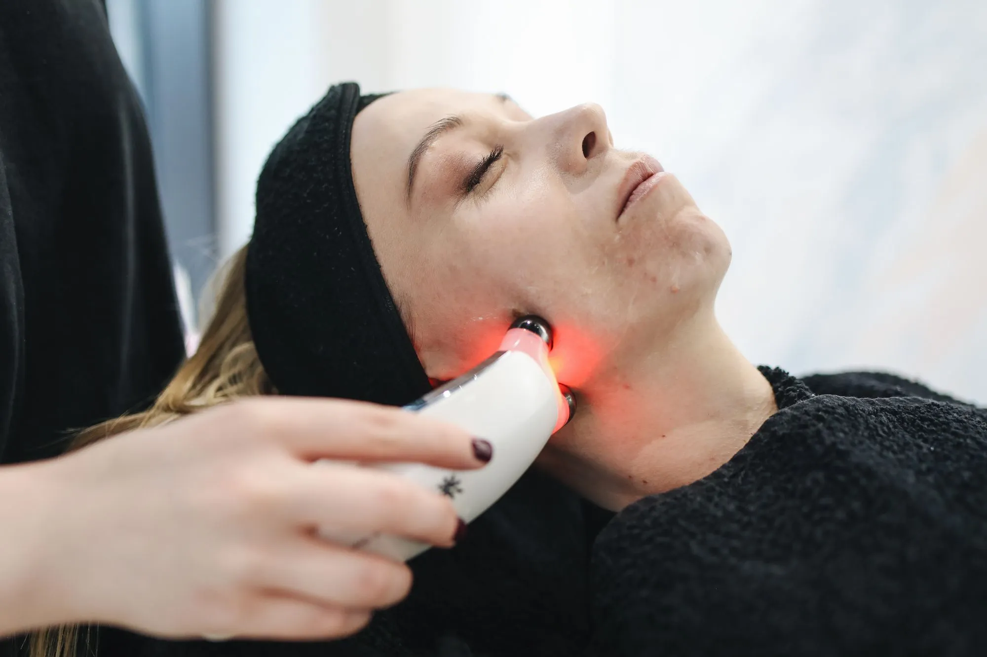LED light therapy during a facial