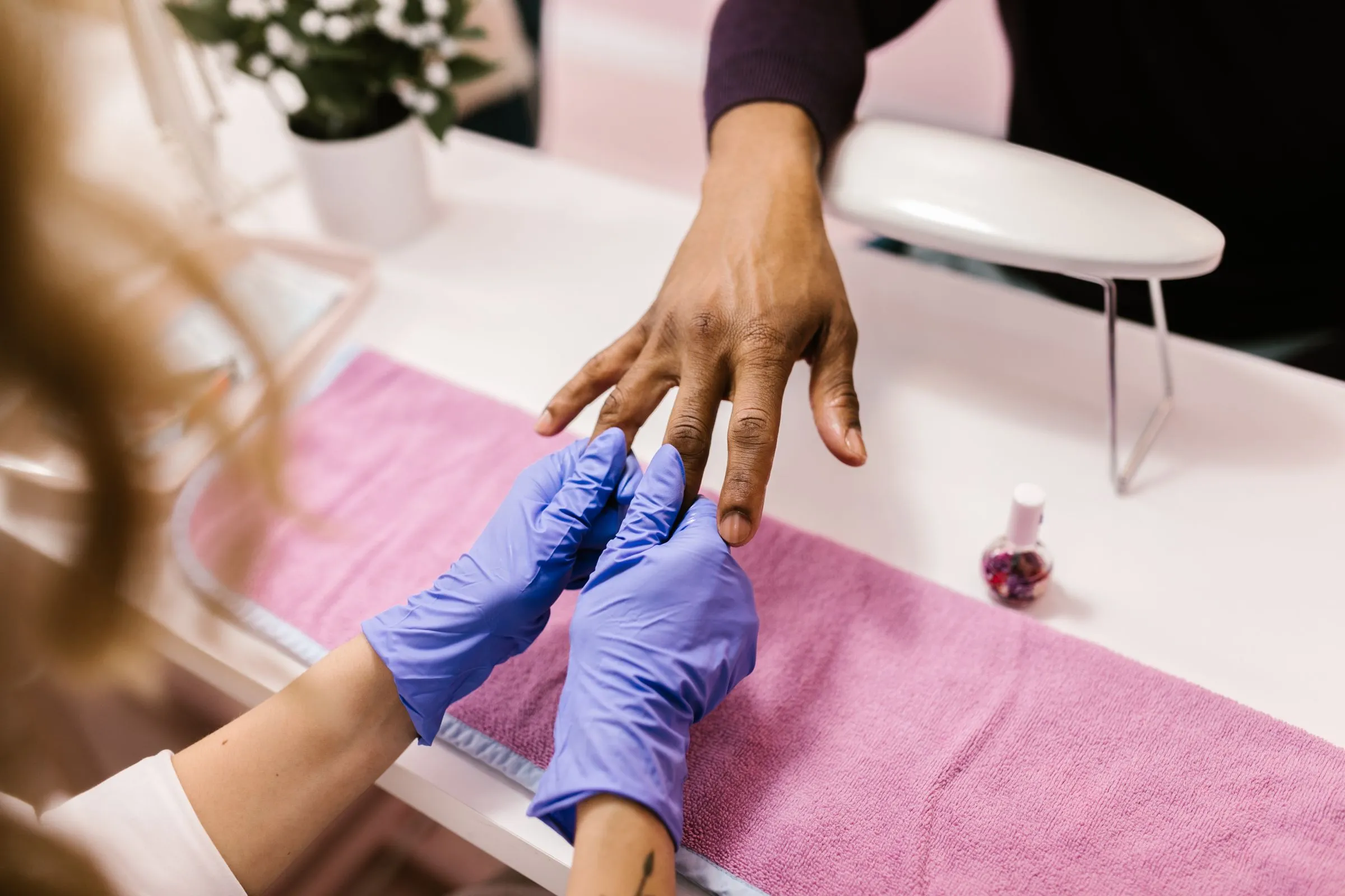 Nail technician giving a manicure